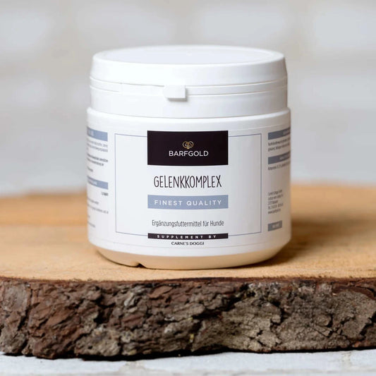 Gelenkkomplex 200 g Dose auf Holzbrett.